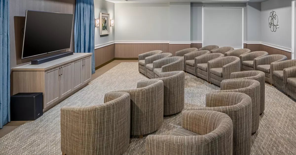 spacious movie theatre at chartwell carlton retirement residence